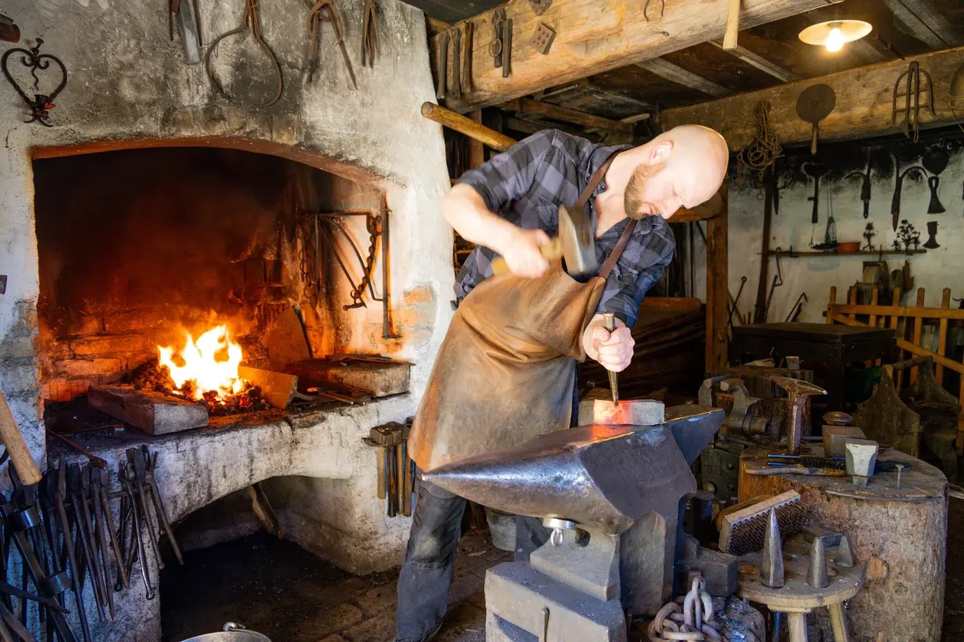 The blacksmith at work in the craftsmen's house